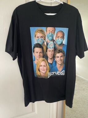 NWOT Scrubs Black Graphic Crewneck Tee with Cast Print